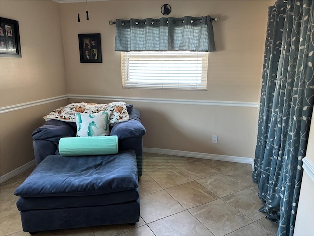 sitting room with tile patterned floors