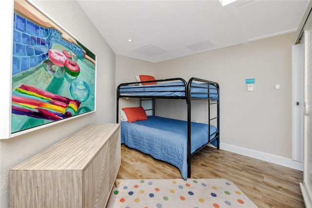 bedroom featuring light wood-type flooring