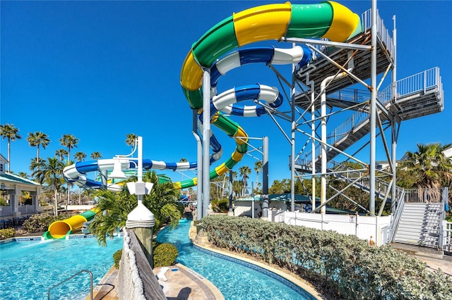 view of pool featuring a water slide