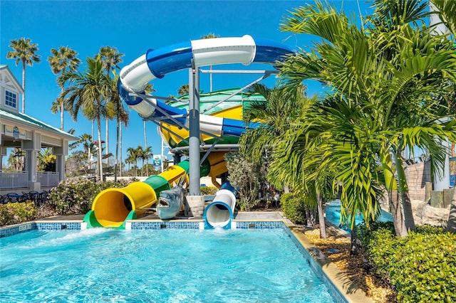 view of pool featuring a water slide