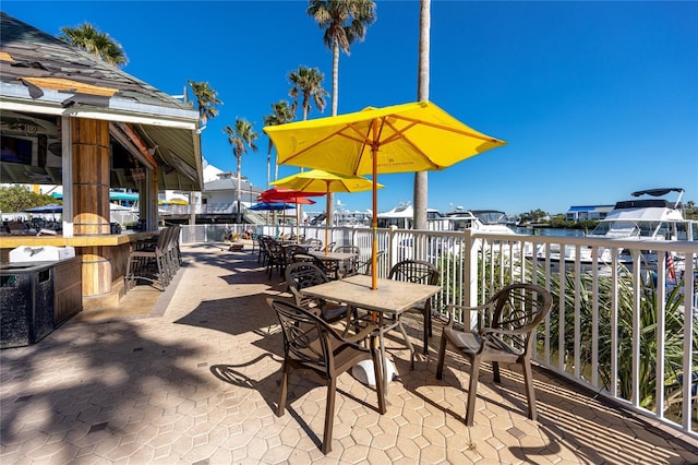 399 2nd St Unit 718, Indian Rocks Beach, FL 33785 - view of patio with a water view