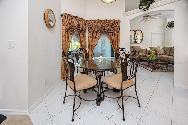 dining area featuring ceiling fan