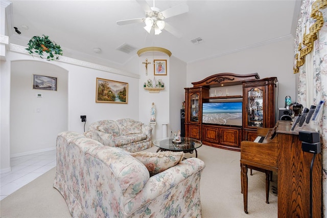 living room with ceiling fan and light tile patterned flooring