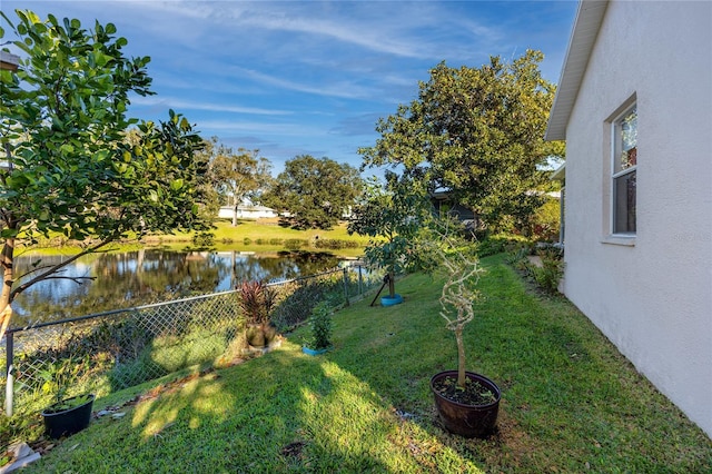 view of yard with a water view