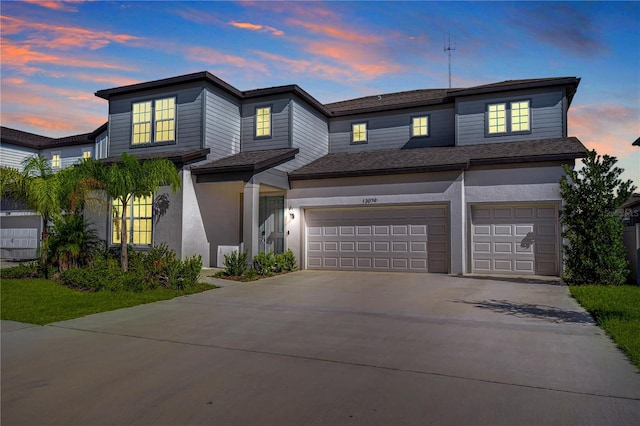 view of front of property featuring a garage