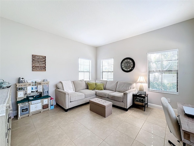 living room with light tile patterned floors