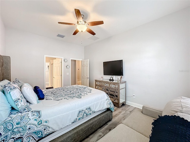 bedroom featuring light hardwood / wood-style floors and ceiling fan