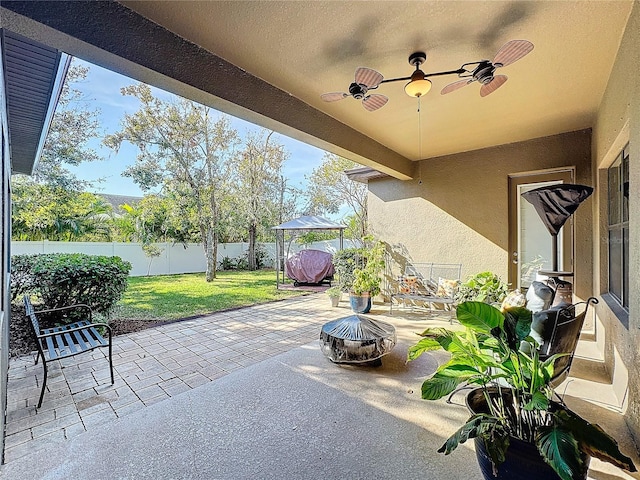 view of patio with ceiling fan