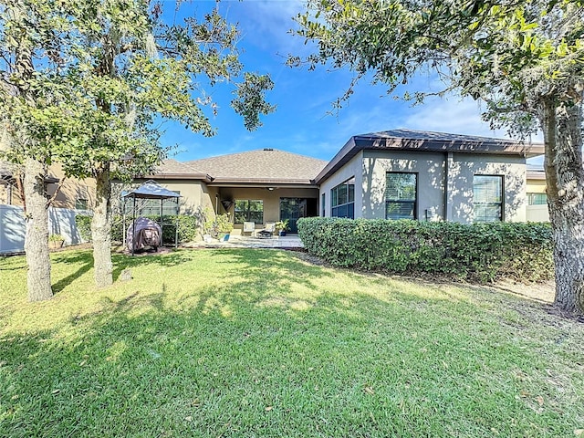 view of front of home with a front yard