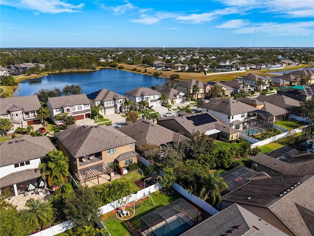 drone / aerial view with a water view