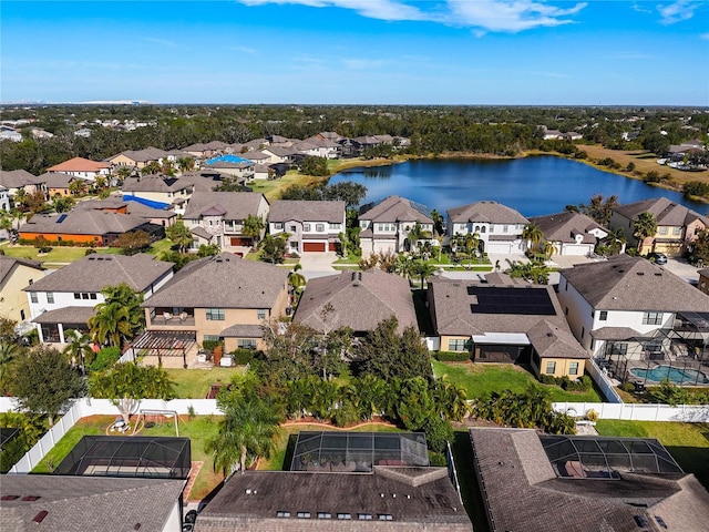 drone / aerial view with a water view