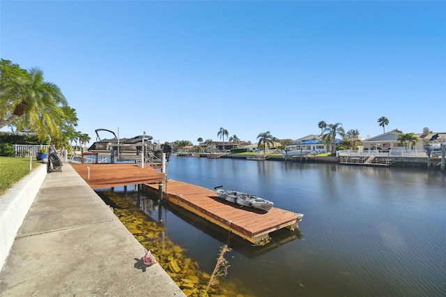 dock area with a water view