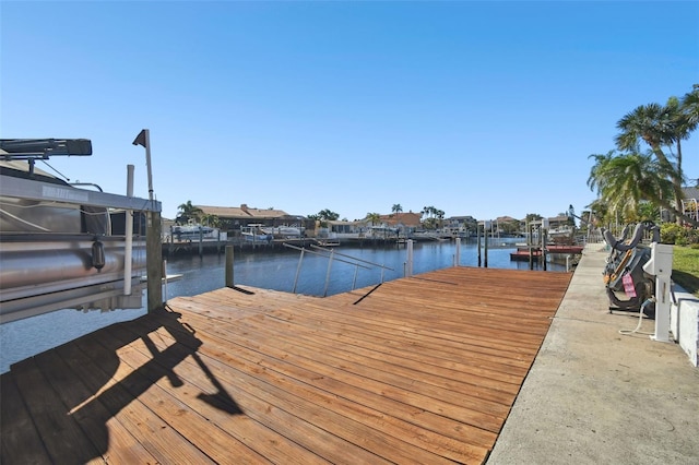 dock area with a water view