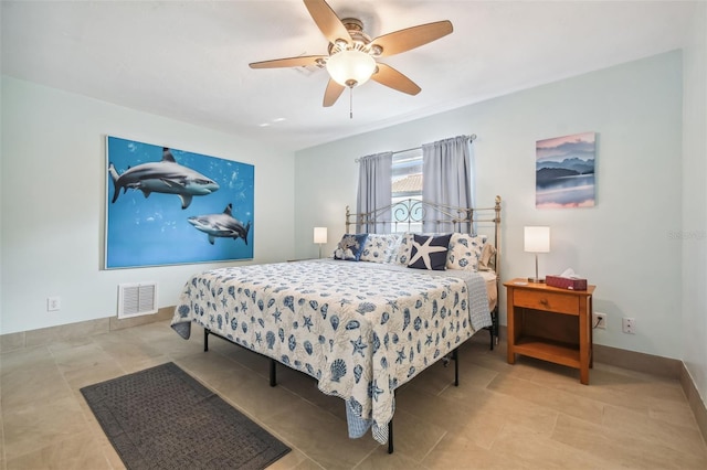 bedroom featuring ceiling fan