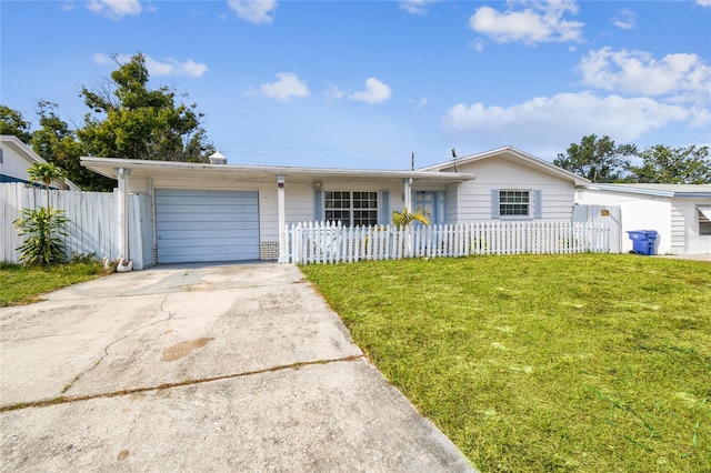 single story home featuring a garage and a front lawn