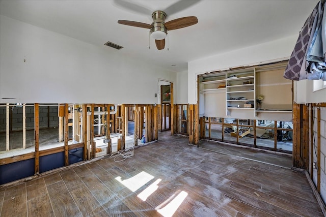 misc room with ceiling fan and hardwood / wood-style flooring