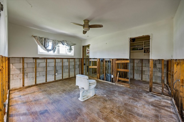 spare room featuring hardwood / wood-style flooring and ceiling fan