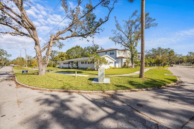 view of front of home featuring a front lawn