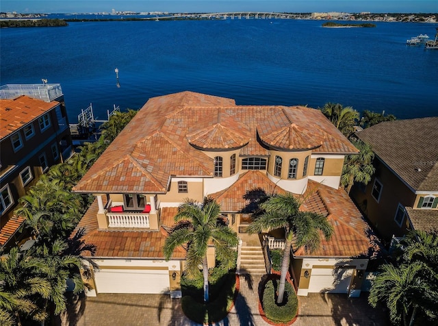 birds eye view of property featuring a water view