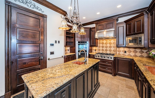 kitchen featuring light stone counters, stainless steel appliances, crown molding, sink, and decorative light fixtures