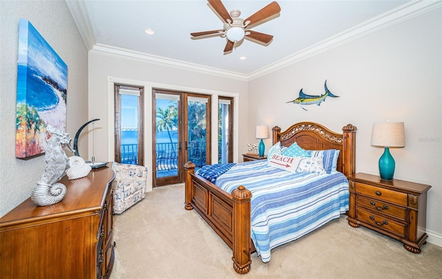 carpeted bedroom with ceiling fan, access to exterior, ornamental molding, and french doors