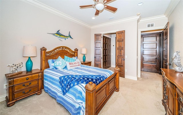 carpeted bedroom featuring ceiling fan and ornamental molding