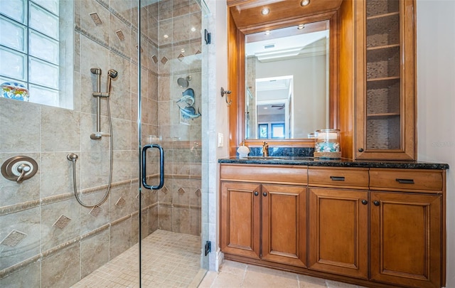 bathroom with vanity and an enclosed shower