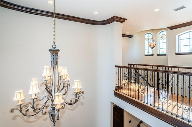 details featuring a chandelier and ornamental molding