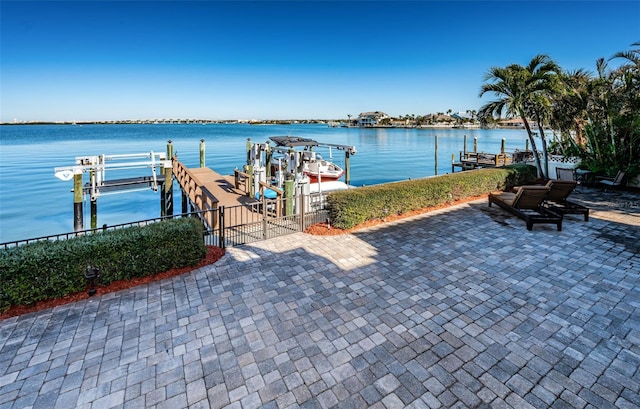 dock area featuring a water view