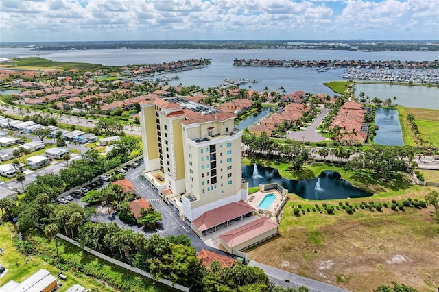 birds eye view of property featuring a water view