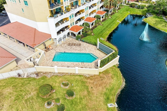 birds eye view of property featuring a water view