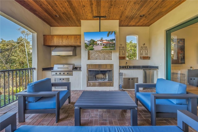 sunroom / solarium with sink and wooden ceiling