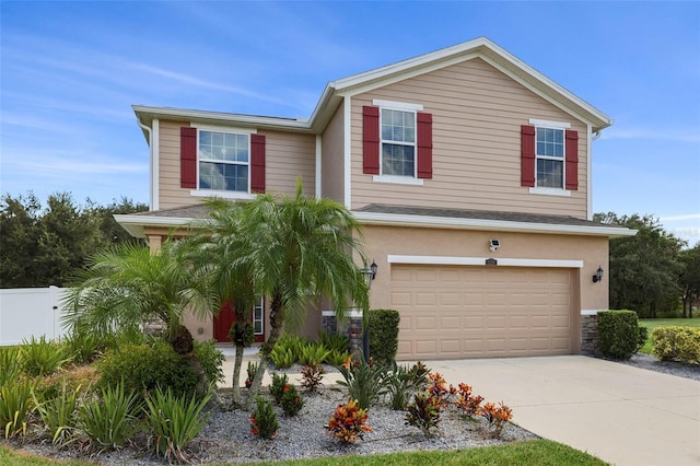 view of front of home with a garage