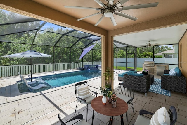 view of pool featuring an in ground hot tub, ceiling fan, glass enclosure, a patio area, and a grill