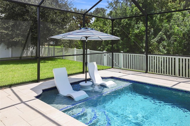 view of pool featuring a lanai, a yard, and a patio