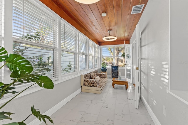 sunroom / solarium with wood ceiling