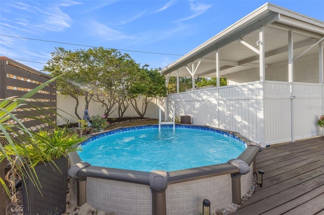 view of pool featuring a deck