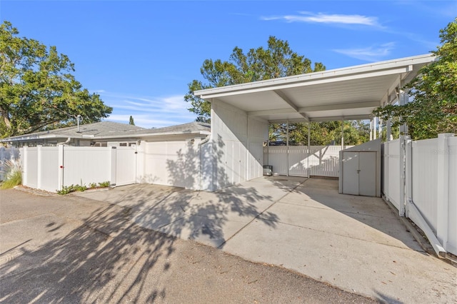 view of parking / parking lot with a carport