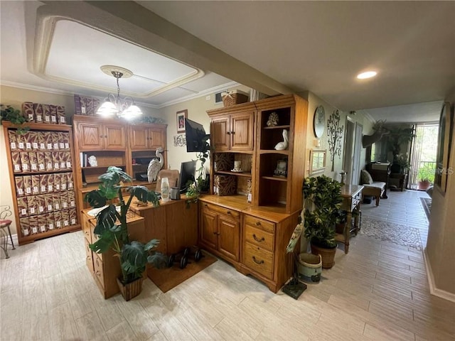 office featuring ornamental molding and an inviting chandelier