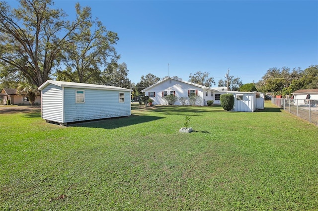 view of yard featuring a storage unit