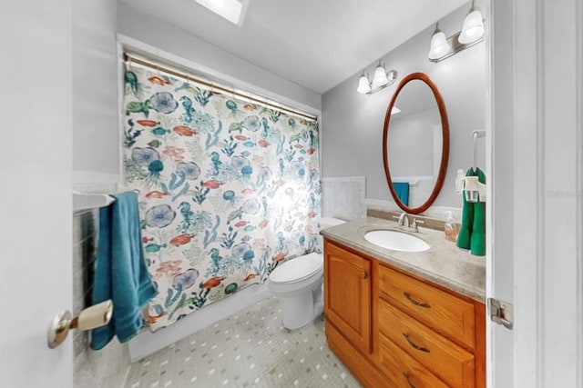 38919 3rd Ave, Zephyrhills, FL 33542 - bathroom with vanity and toilet