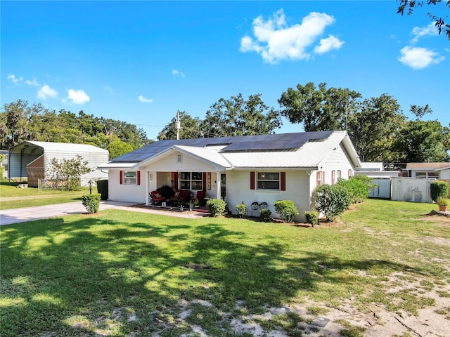 38919 3rd Ave, Zephyrhills, FL 33542 - view of front of home with roof mounted solar panels