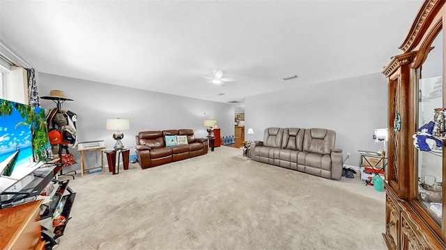 38919 3rd Ave, Zephyrhills, FL 33542 - living room with carpet and a ceiling fan