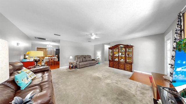 38919 3rd Ave, Zephyrhills, FL 33542 - carpeted living area featuring a ceiling fan and baseboards