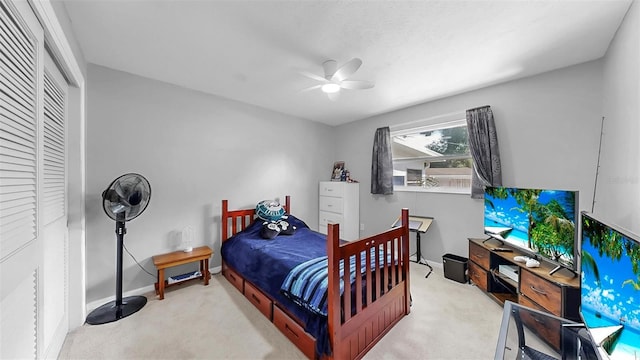 38919 3rd Ave, Zephyrhills, FL 33542 - carpeted bedroom with a ceiling fan and baseboards
