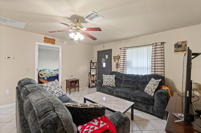 tiled living room featuring ceiling fan