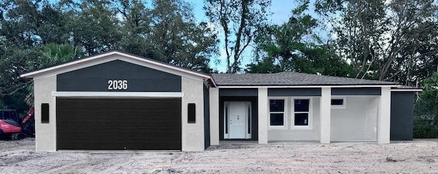 1520 Alameda, Spring Hill, FL 34609 - view of front of property with a garage and stucco siding