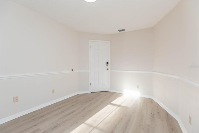 empty room featuring light hardwood / wood-style floors