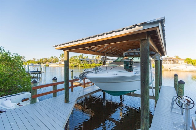 dock area with a water view