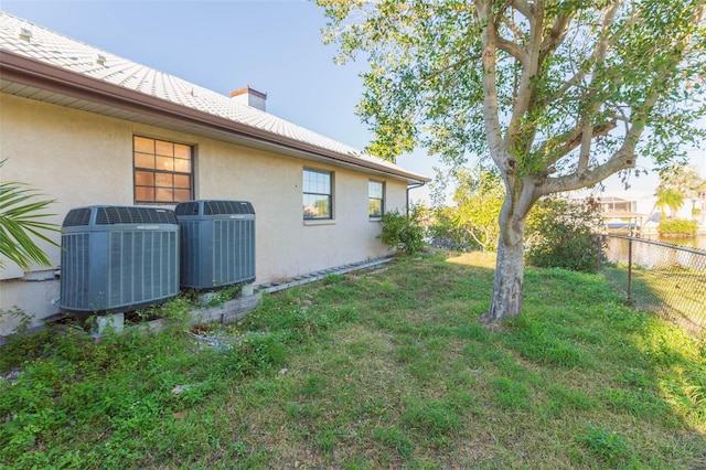 view of yard featuring central AC